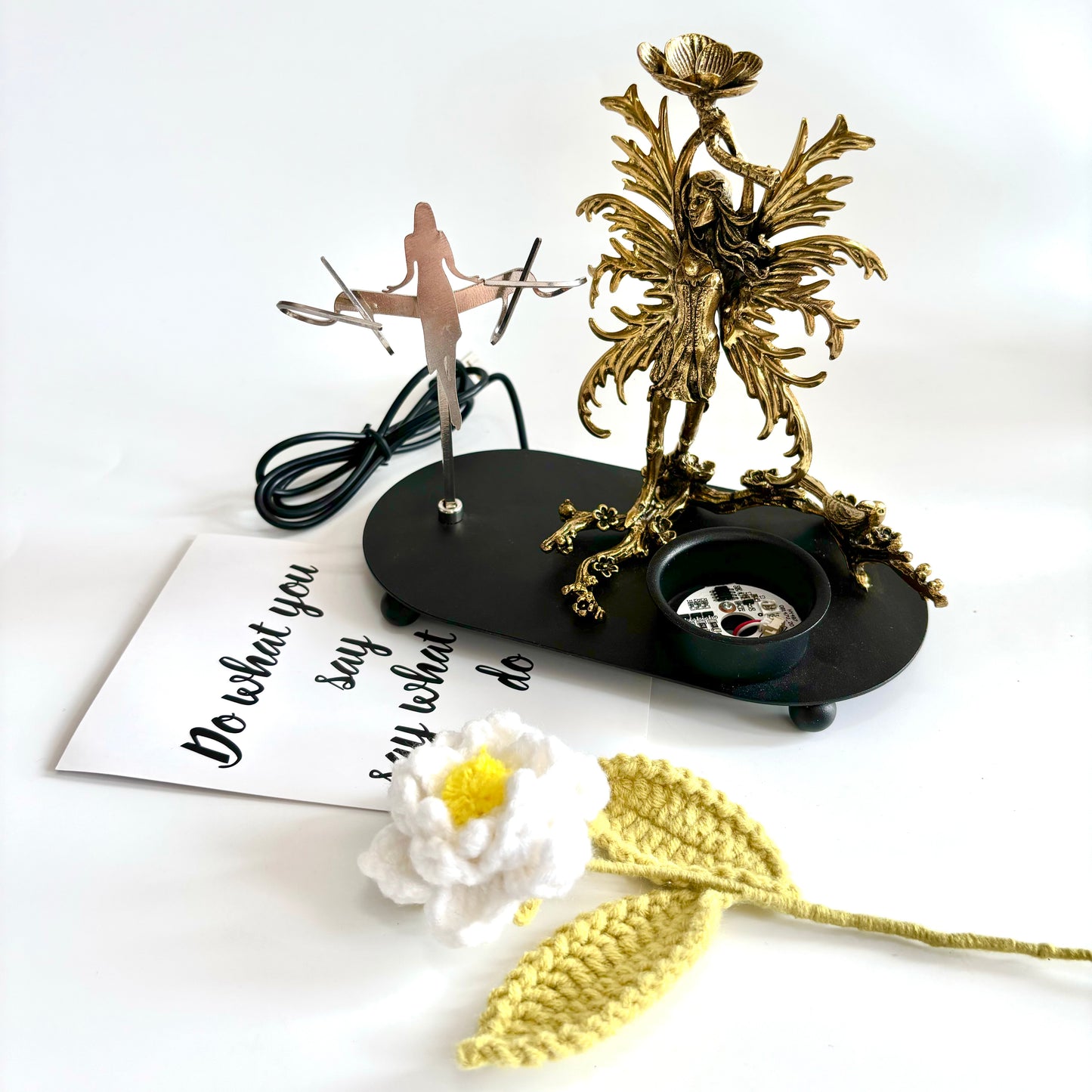 $24.3/1 pce  Golden fairy with wing light sphere crystal base.