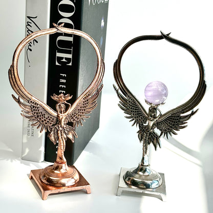 $8.9/1pcs Angle with long wing crystal sphere base.