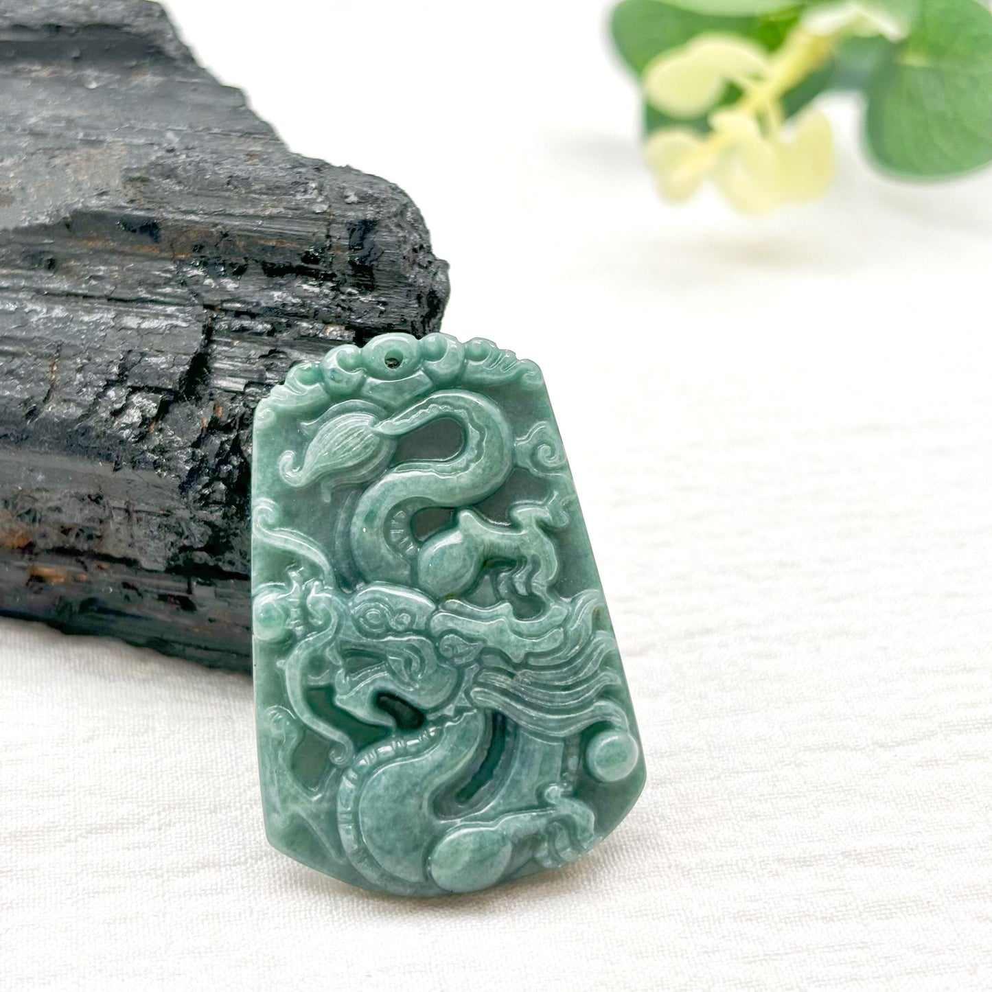 $3/pcs Small carved pendant made of jade material