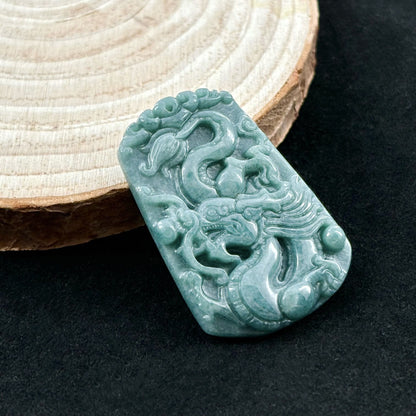 $3/pcs Small carved pendant made of jade material