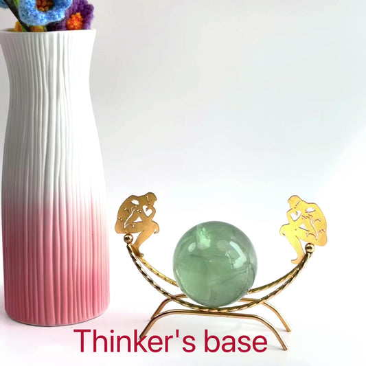 $6.8/1pcs  Brilliant golden thinker sphere crystal sphere base.