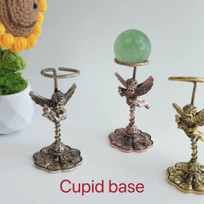 $5.6/1pcs Cupid crystal sphere base.